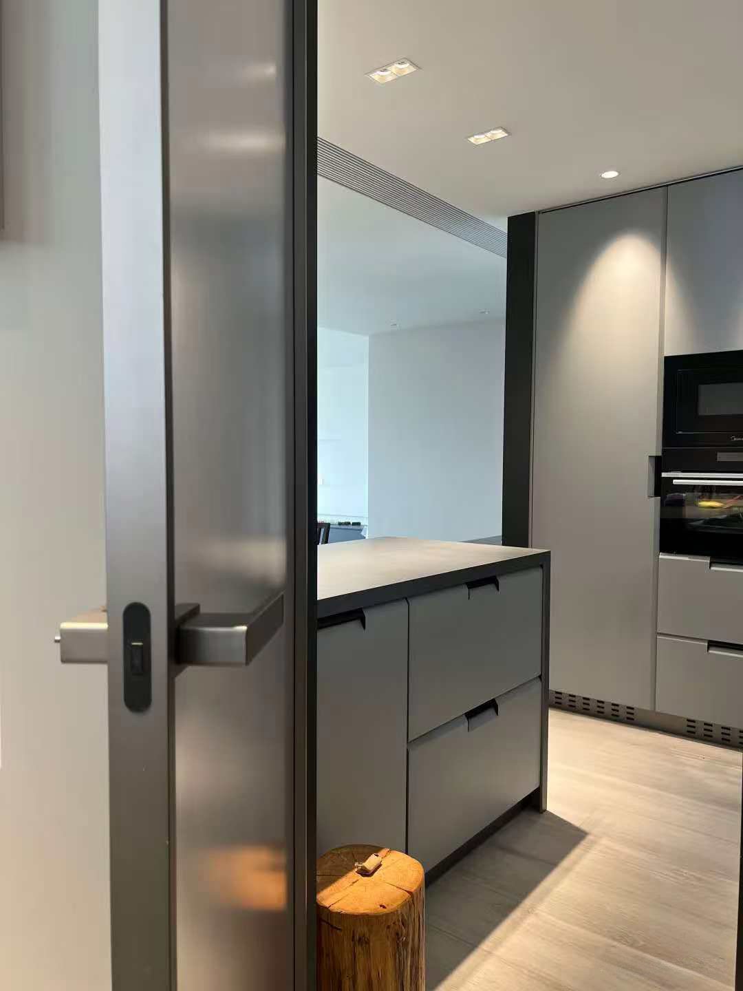 High-end gray minimalist small kitchen - Image 13